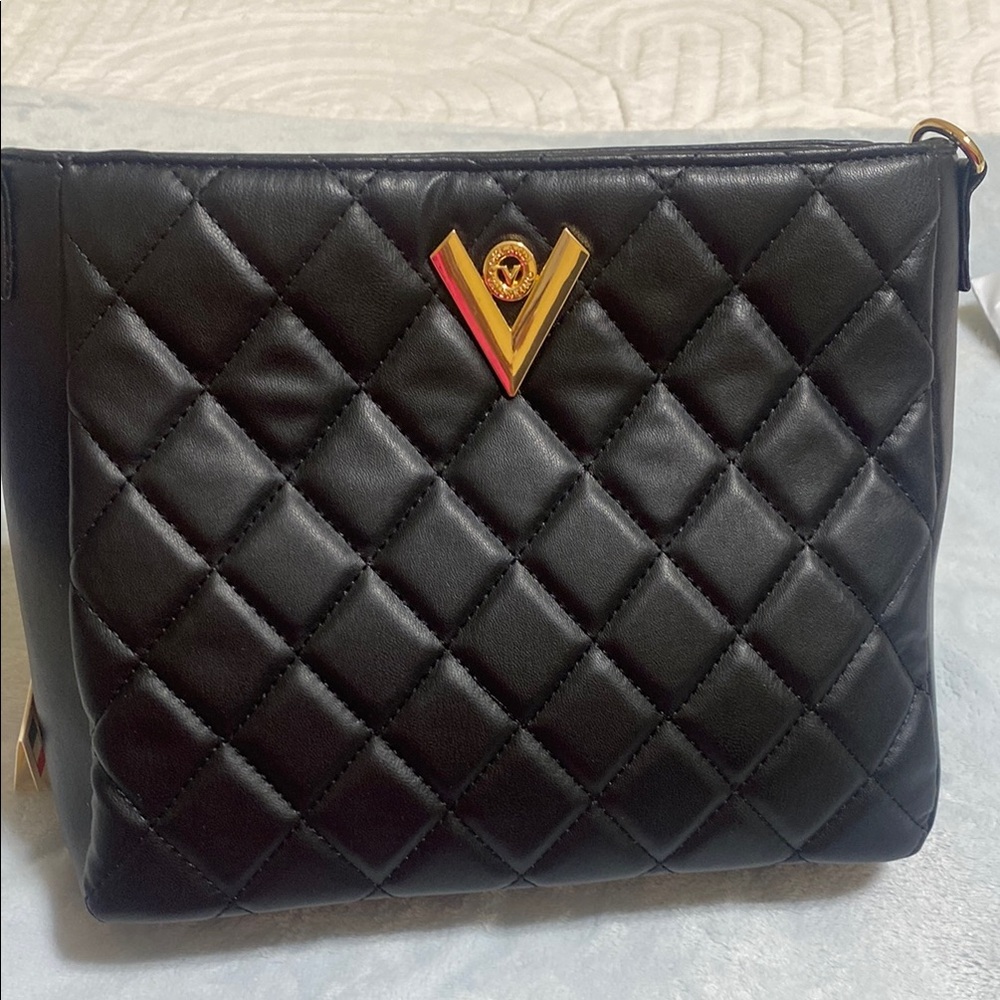 Versatile Black Quilted Bag with Gold Detail